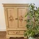 2-door flowered wooden cabinet