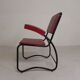 Set of 4 armchairs and a coffee table with tubular structure in Bauhaus style, 1950s.