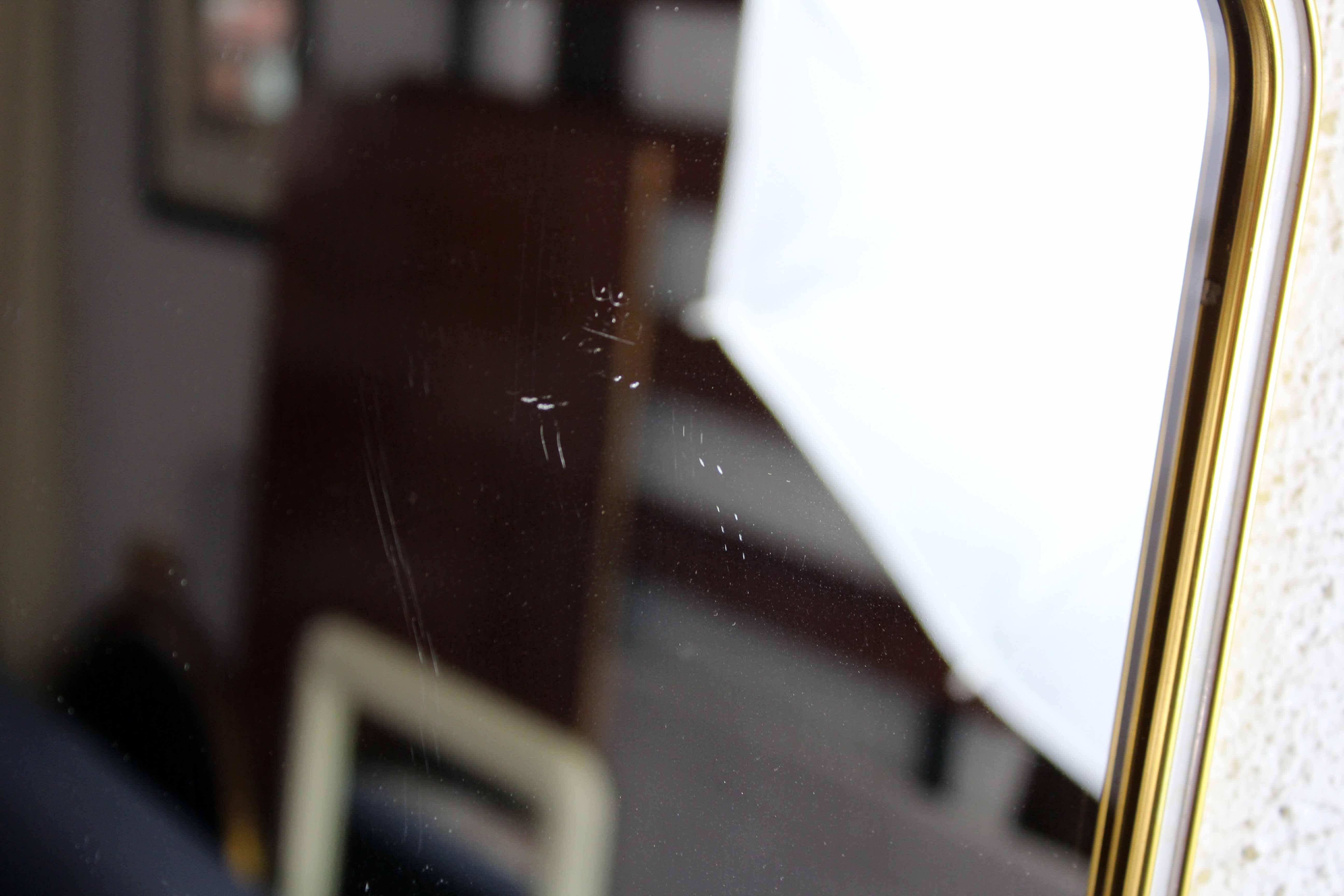 Freeform brass mirror, 42x28 cm