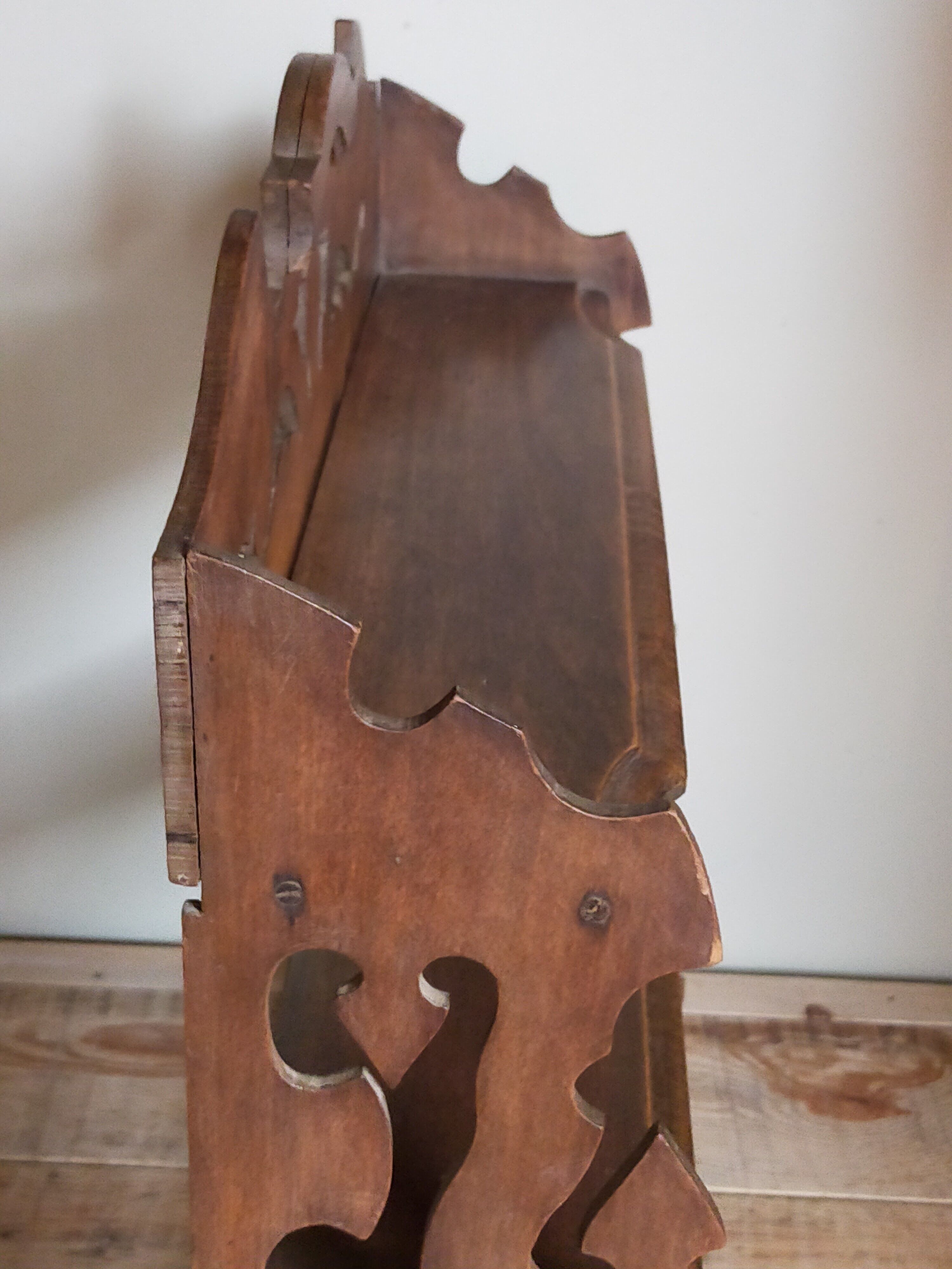 Old carved wooden wall shelf