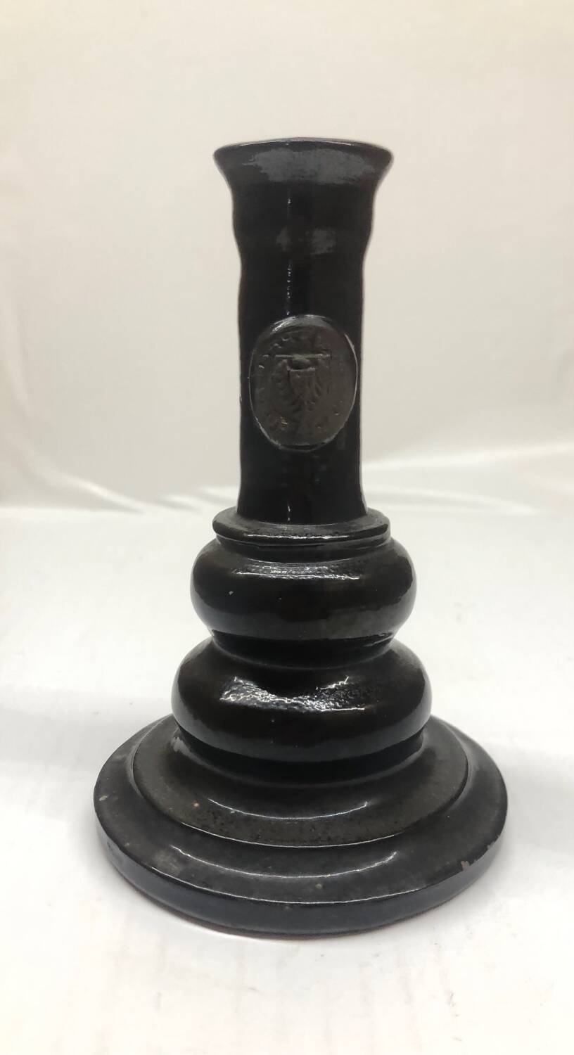 Black ceramic candlestick and escutcheon