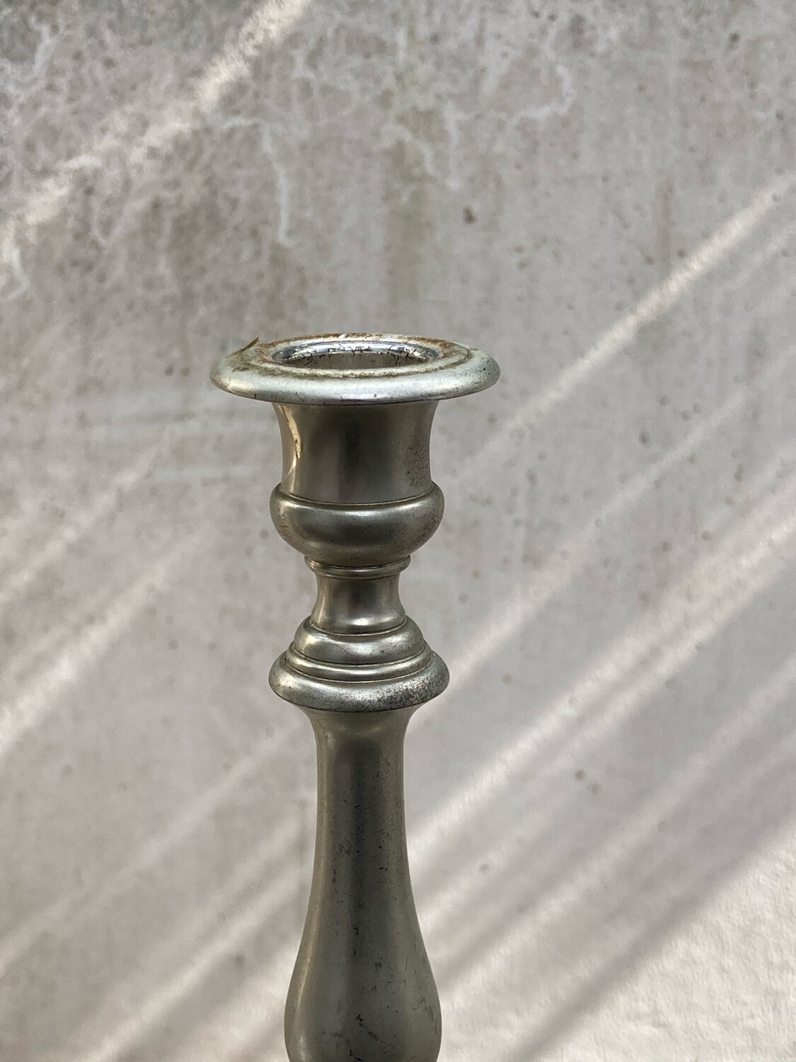 Two antique candle holders