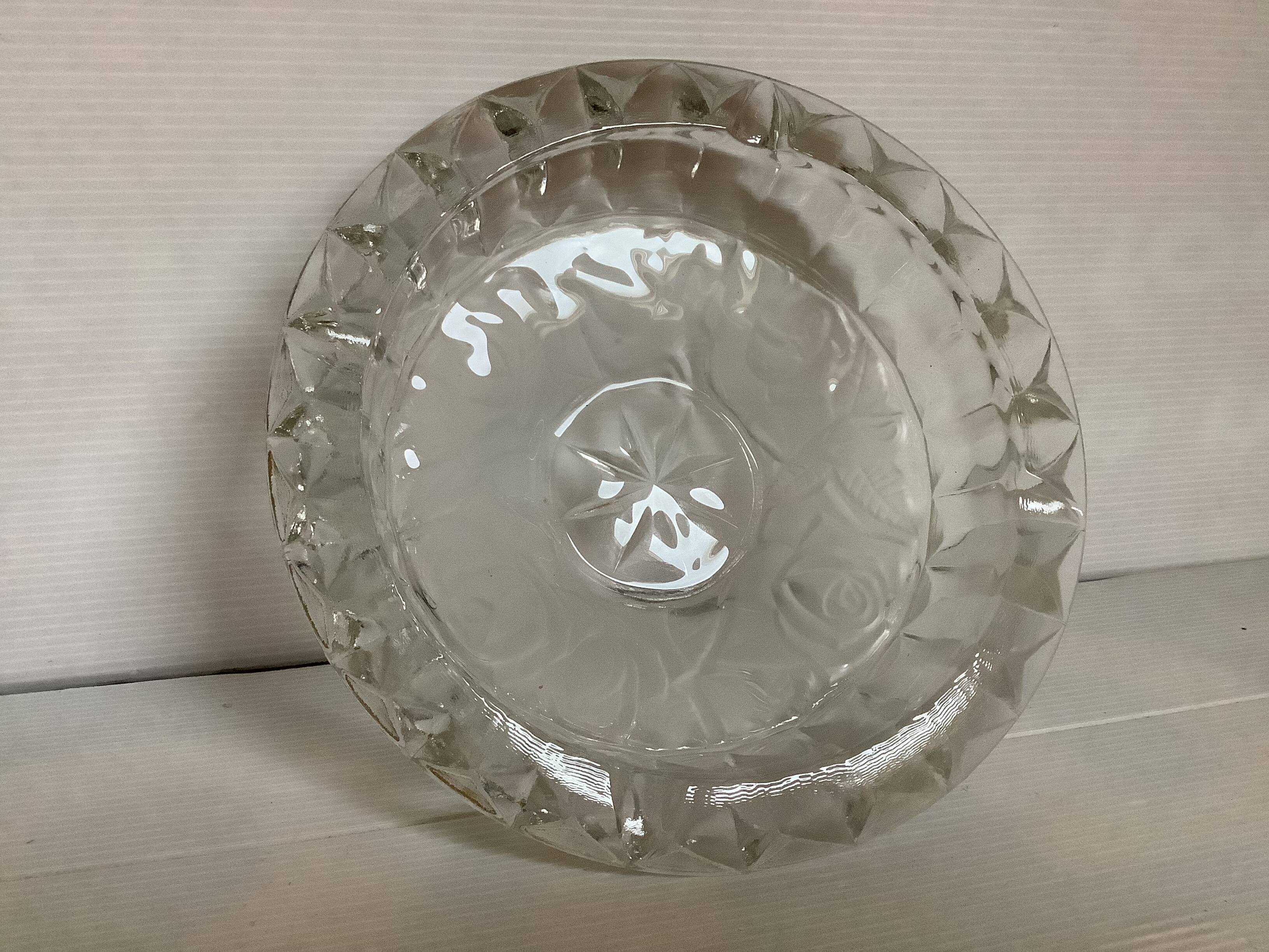 Large glass ashtray with frosted flowers.