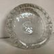 Large glass ashtray with frosted flowers.
