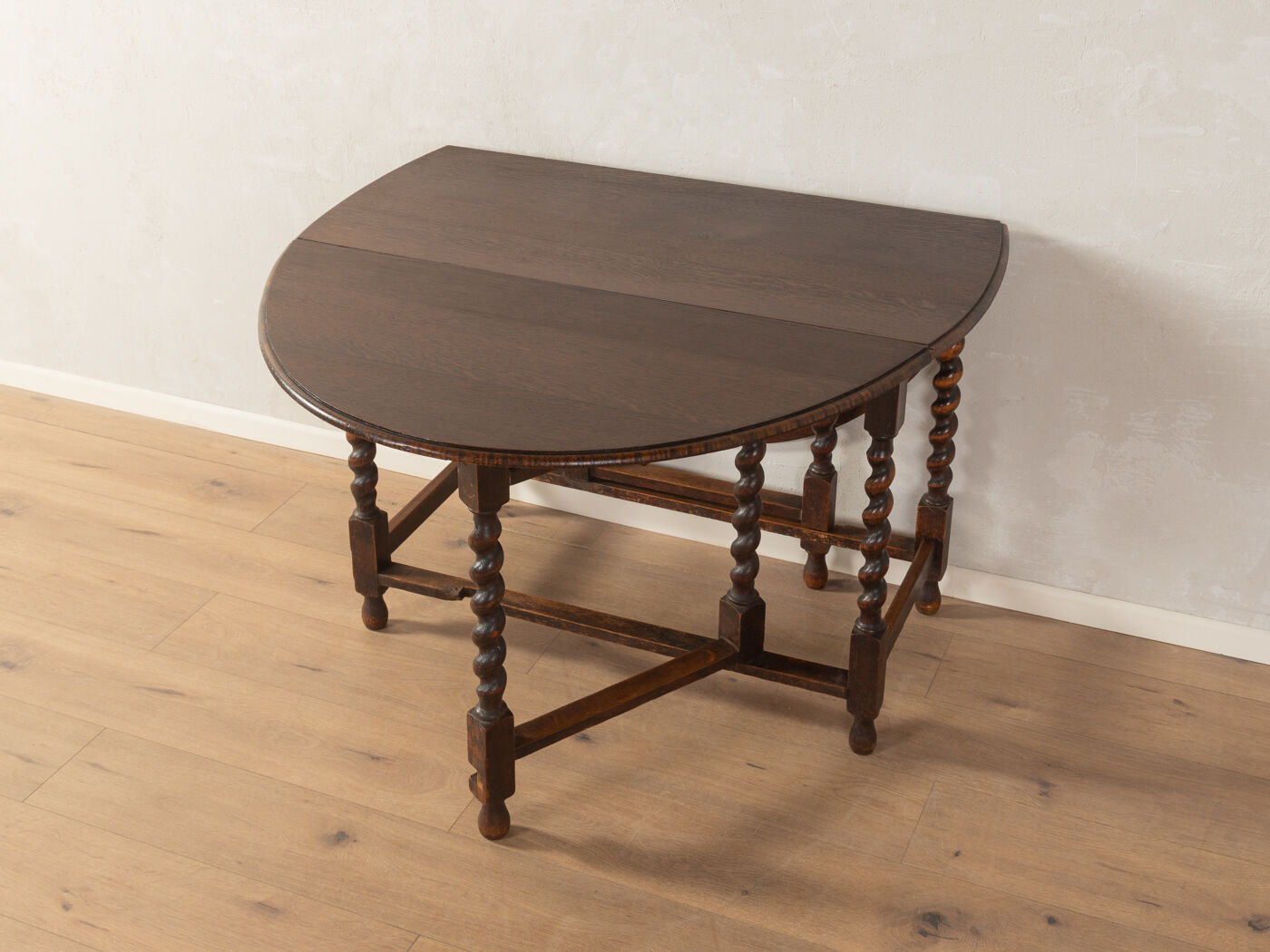 Antique gateleg table from the 1920s, solid oak