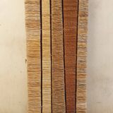 Straw and woven rope screen with metal structure