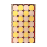 Old stained glass window with geometric patterns