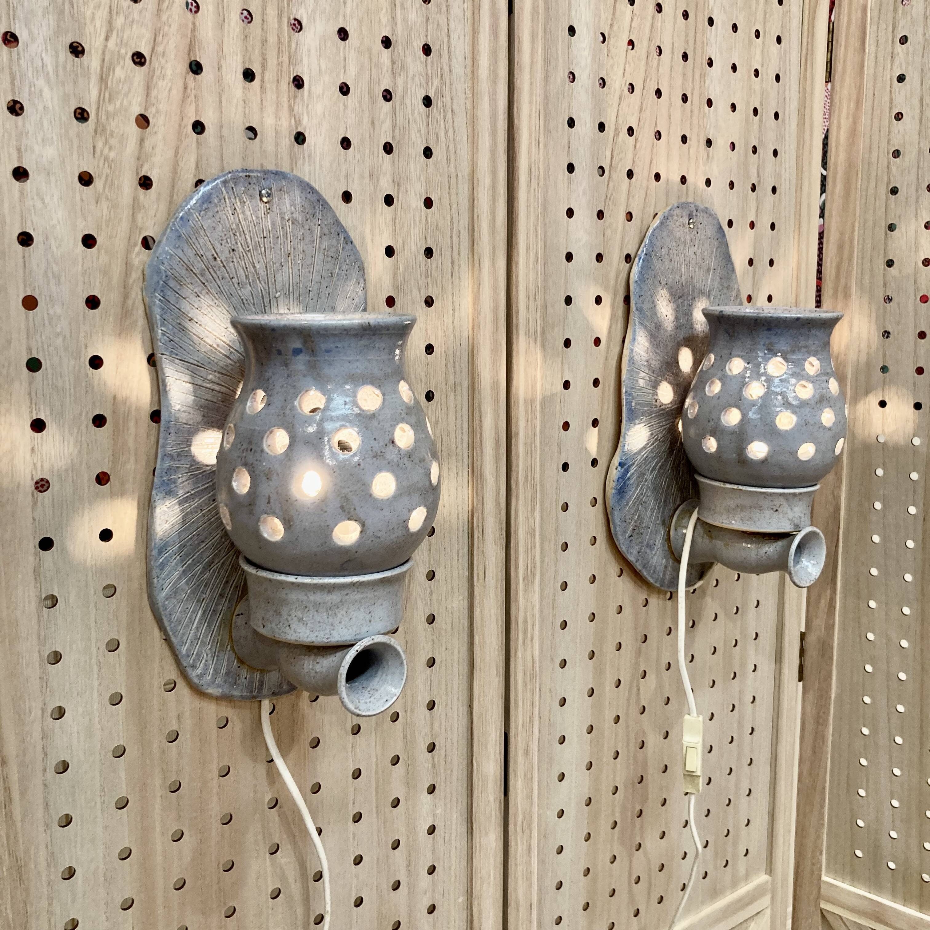 Pair of enamelled terracotta wall lights 1960.