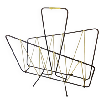 Black metal magazine rack with yellow scoubidou thread