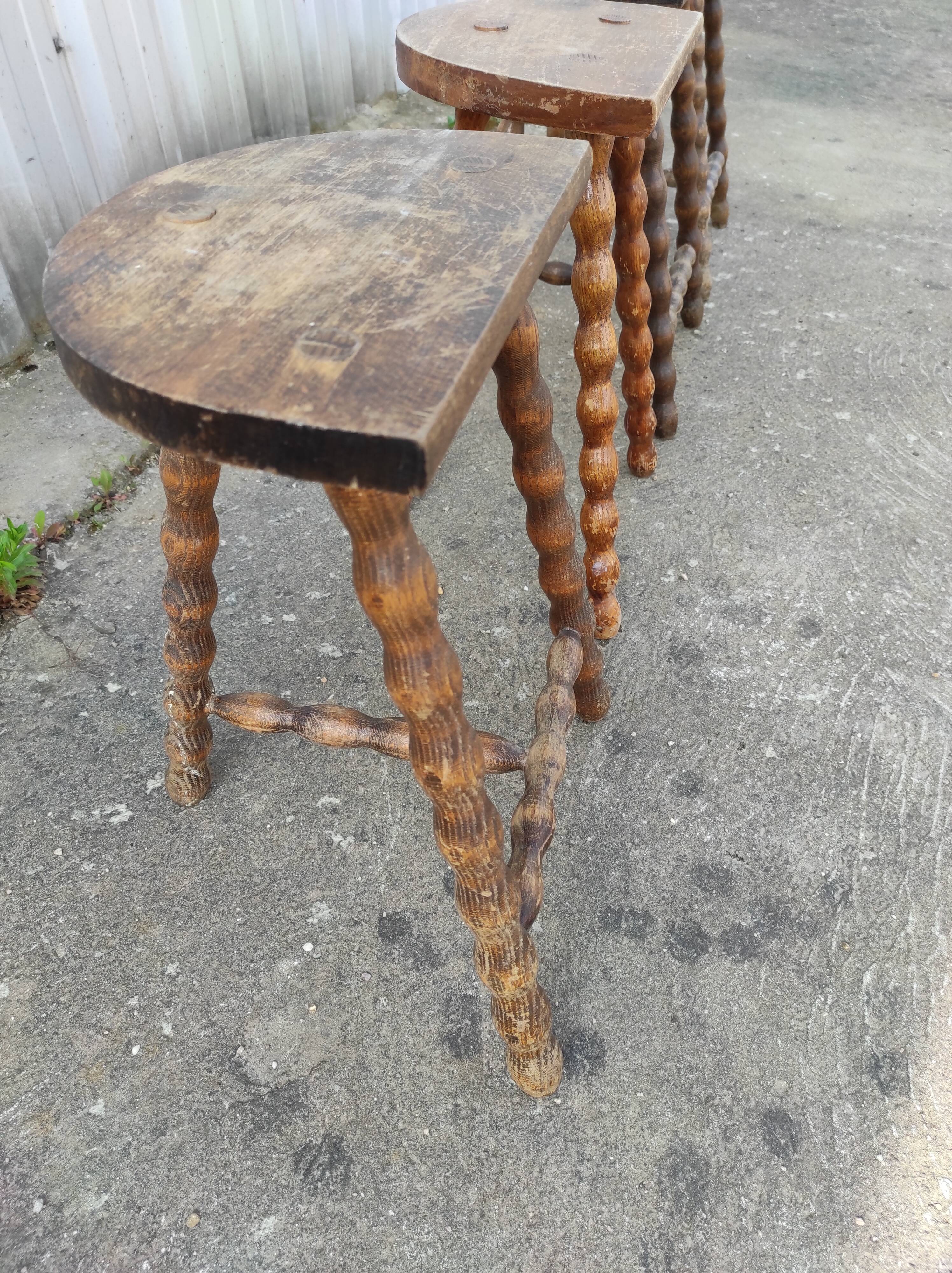 Lot 4 twisted wood tripod stools