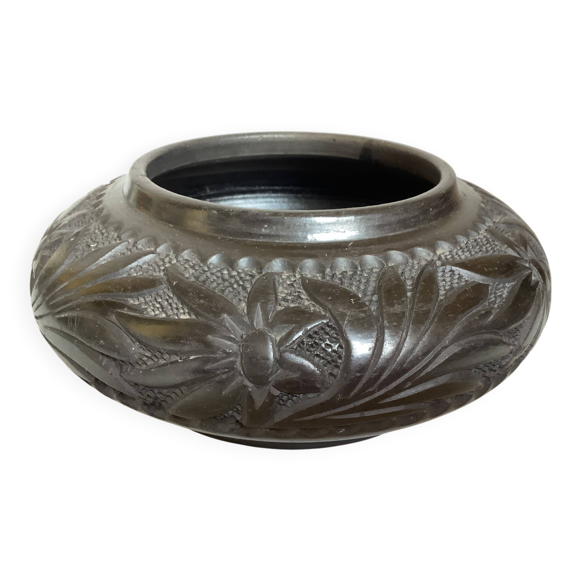Black pottery catchall worked from Marginea, Romania.