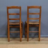 Pair of rush-seated chairs in cherry wood – late 19th century