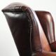 Comfortable cowhide wingback armchair in English style
