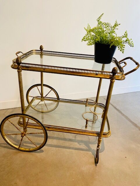 Vintage golden rolling trolley