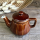 Vintage brown ceramic teapot