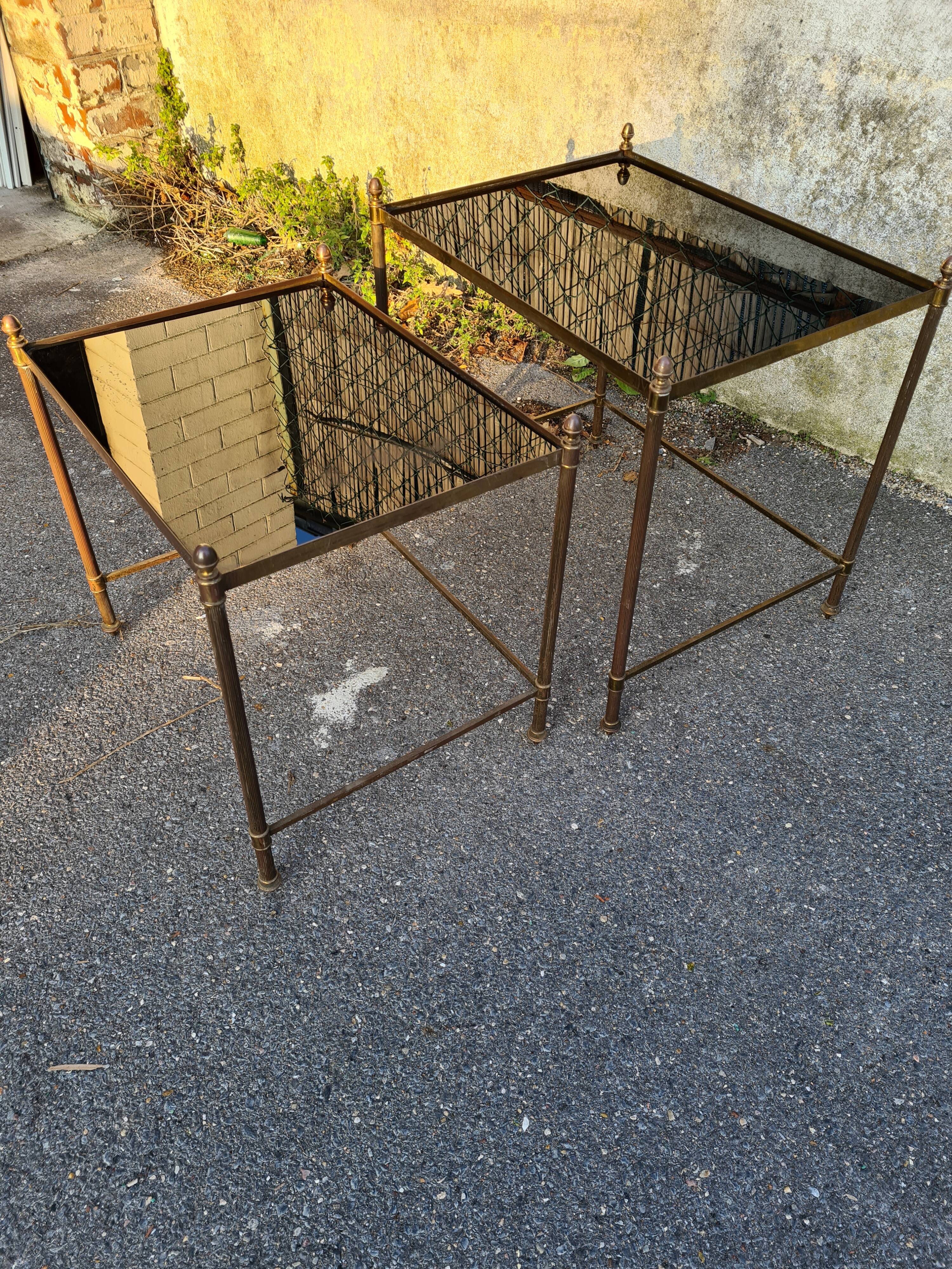 2 brass trundle tables and vintage black glass