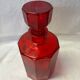 Carafe en verre rouge