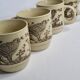 Ensemble de quatre mugs en grès émaillé à décor d'oiseau, made in england