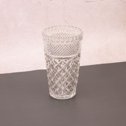 Elegant cut crystal vase in transparent Art Deco style.