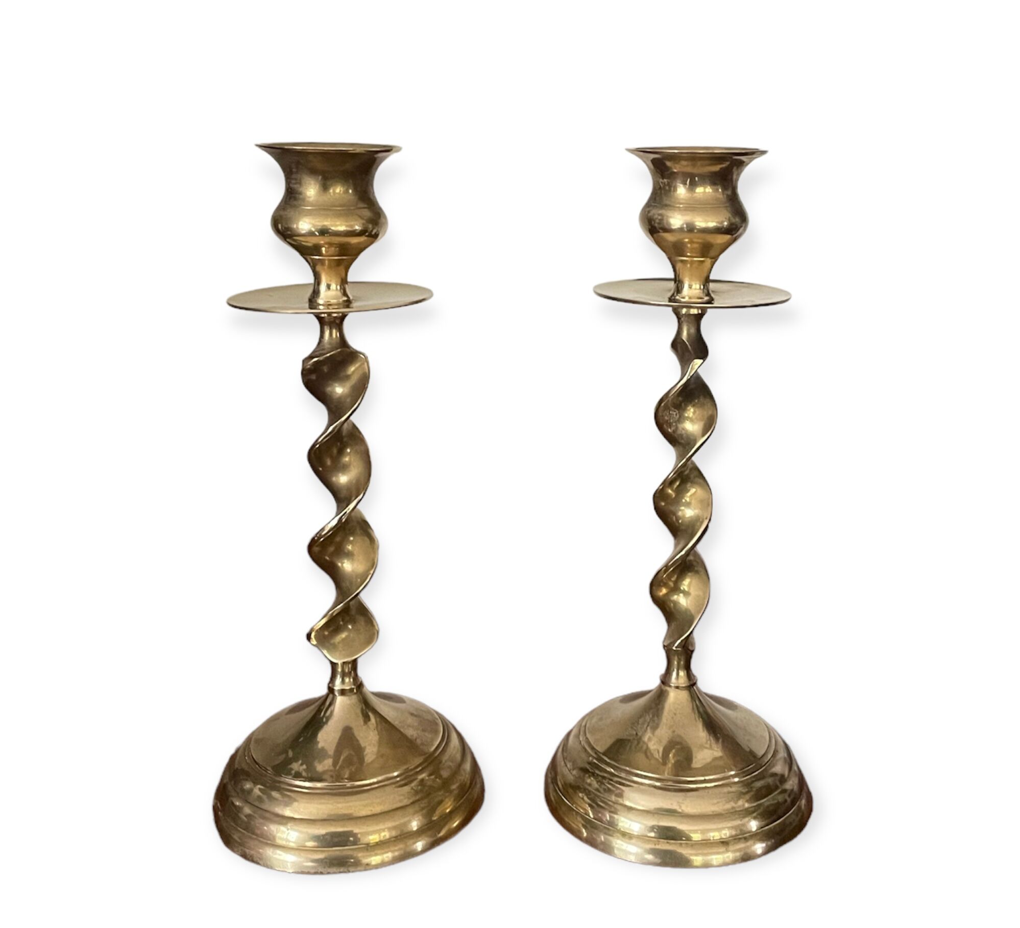 Pair of twisted brass candle holders