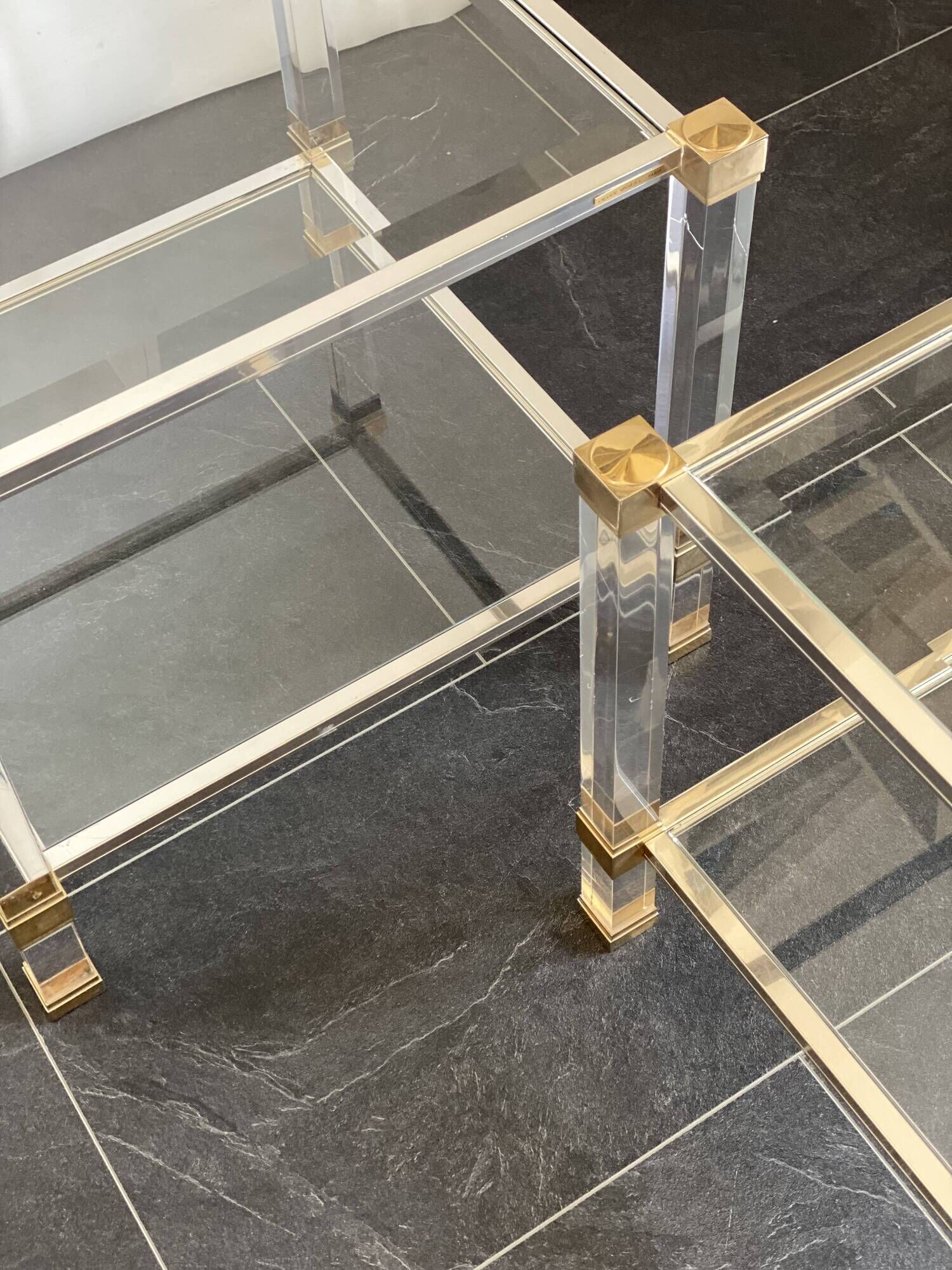 Pair of vintage and brass glass hollywood regency side tables by peter vandel