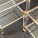 Pair of vintage and brass glass hollywood regency side tables by peter vandel