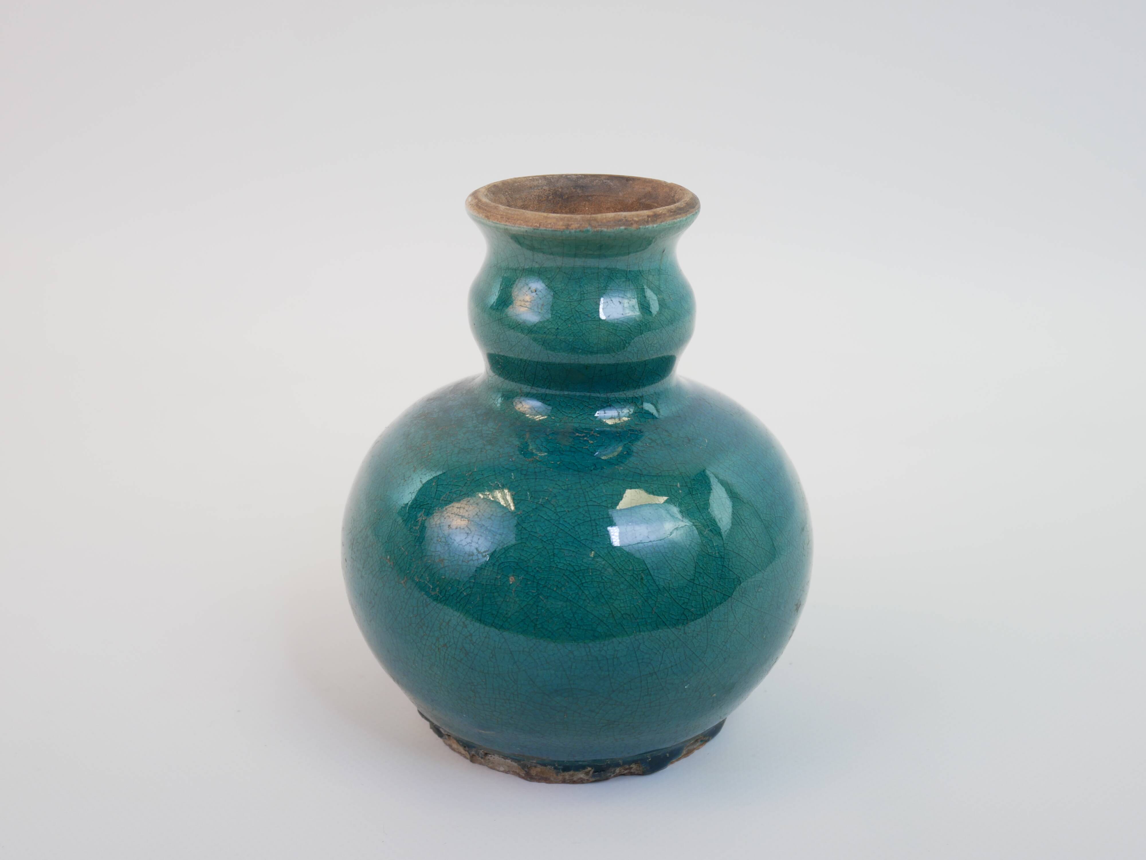 Small old blue ceramic vase