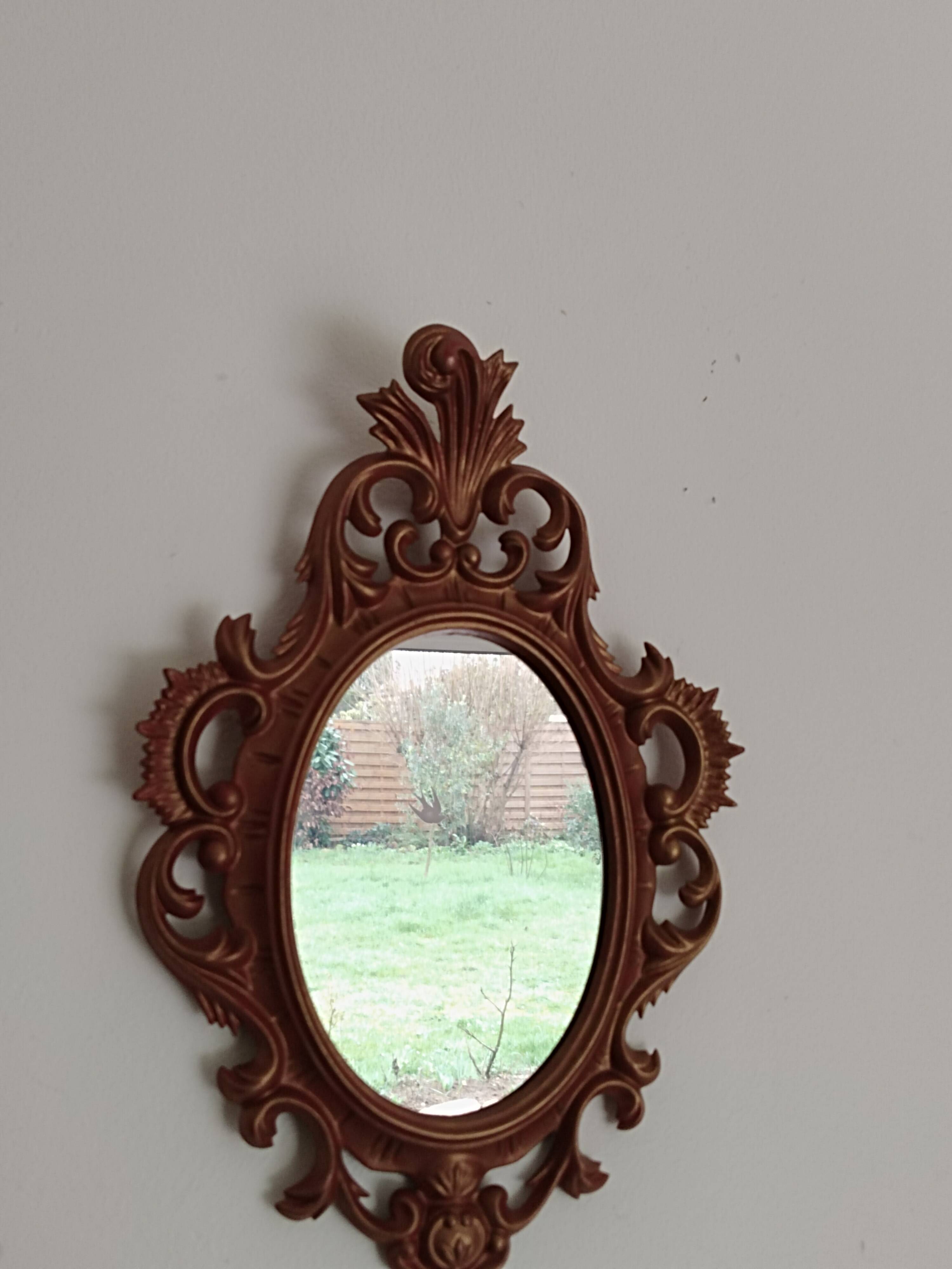 Classic red and gold patinated rocaille mirror, 35 cm x 23 cm