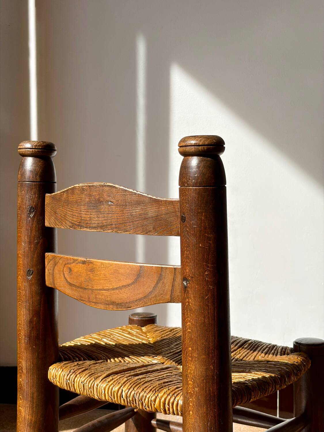 Low fireplace chair attributed to Charles Dudouyt.