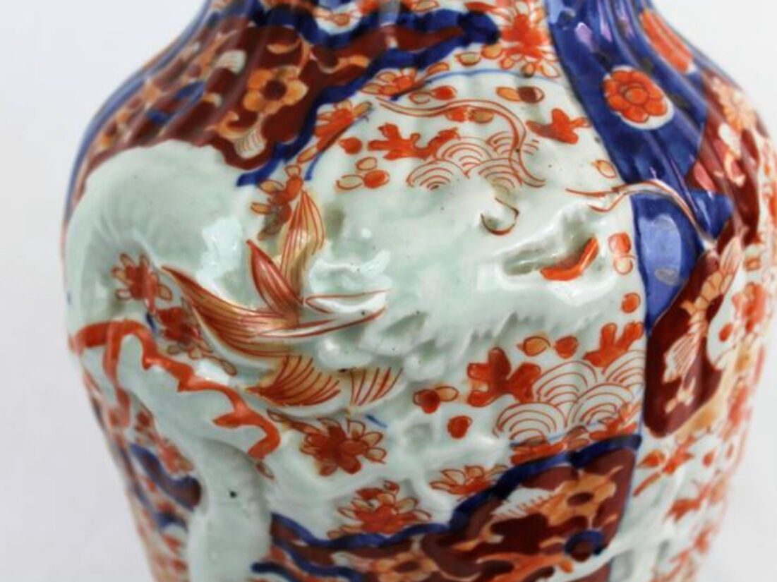 19th century Imari porcelain baluster vase with dragon relief decoration