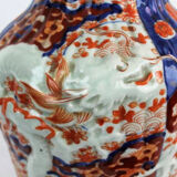 19th century Imari porcelain baluster vase with dragon relief decoration