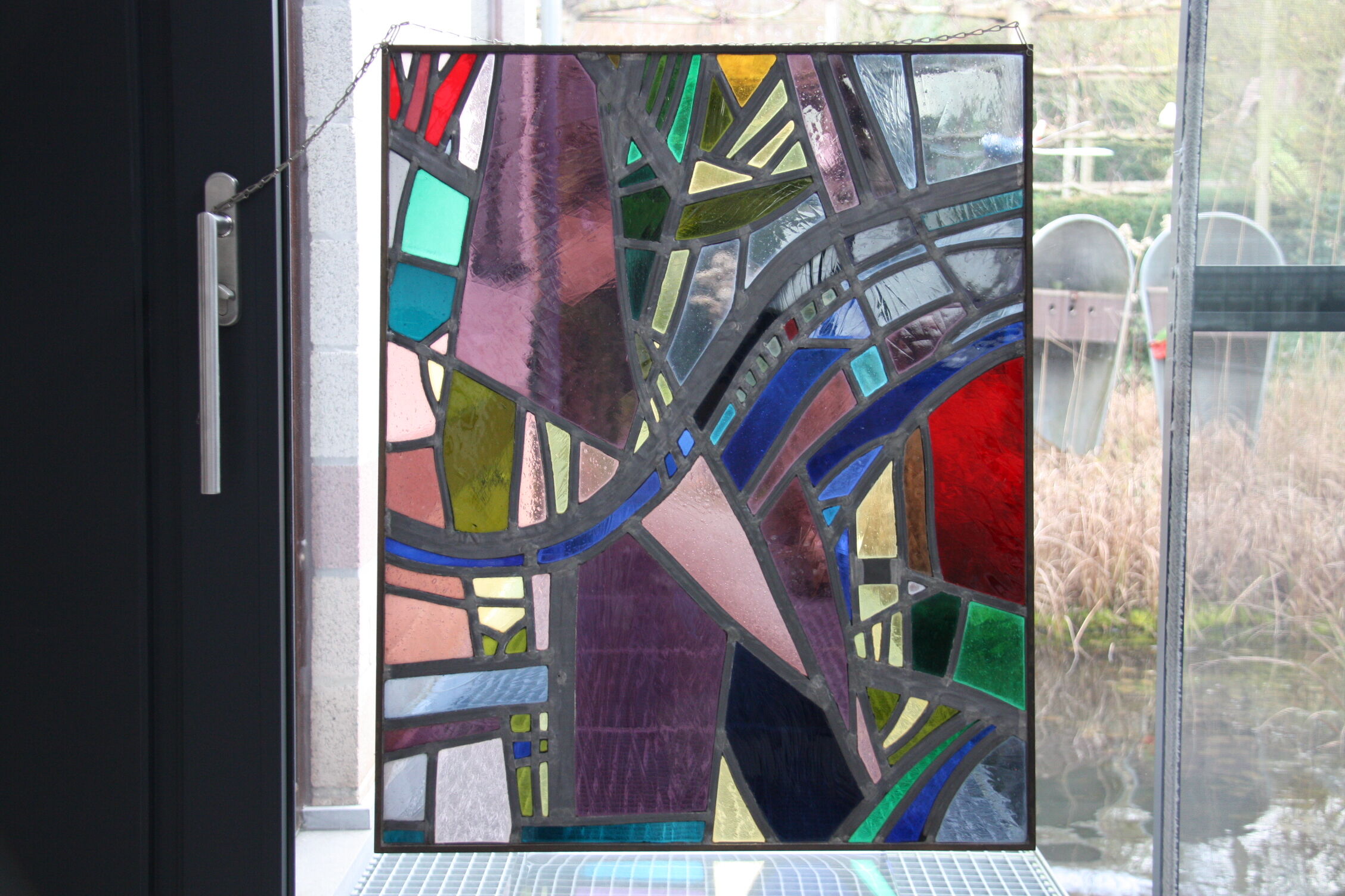 Multicolored stained glass window with hanging system - Germany - 1970's