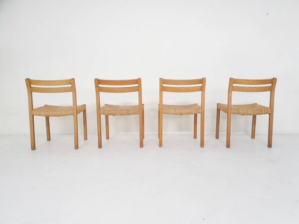 Ensemble de quatre chaises de salle à manger en chêne et sisal modèle 401 par J.L Moller, Danemark années 1970