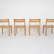Set of four oak and sisal dining chairs model 401 by JL Moller, Denmark 1970's