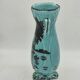 Art Deco turquoise vase with a deer design