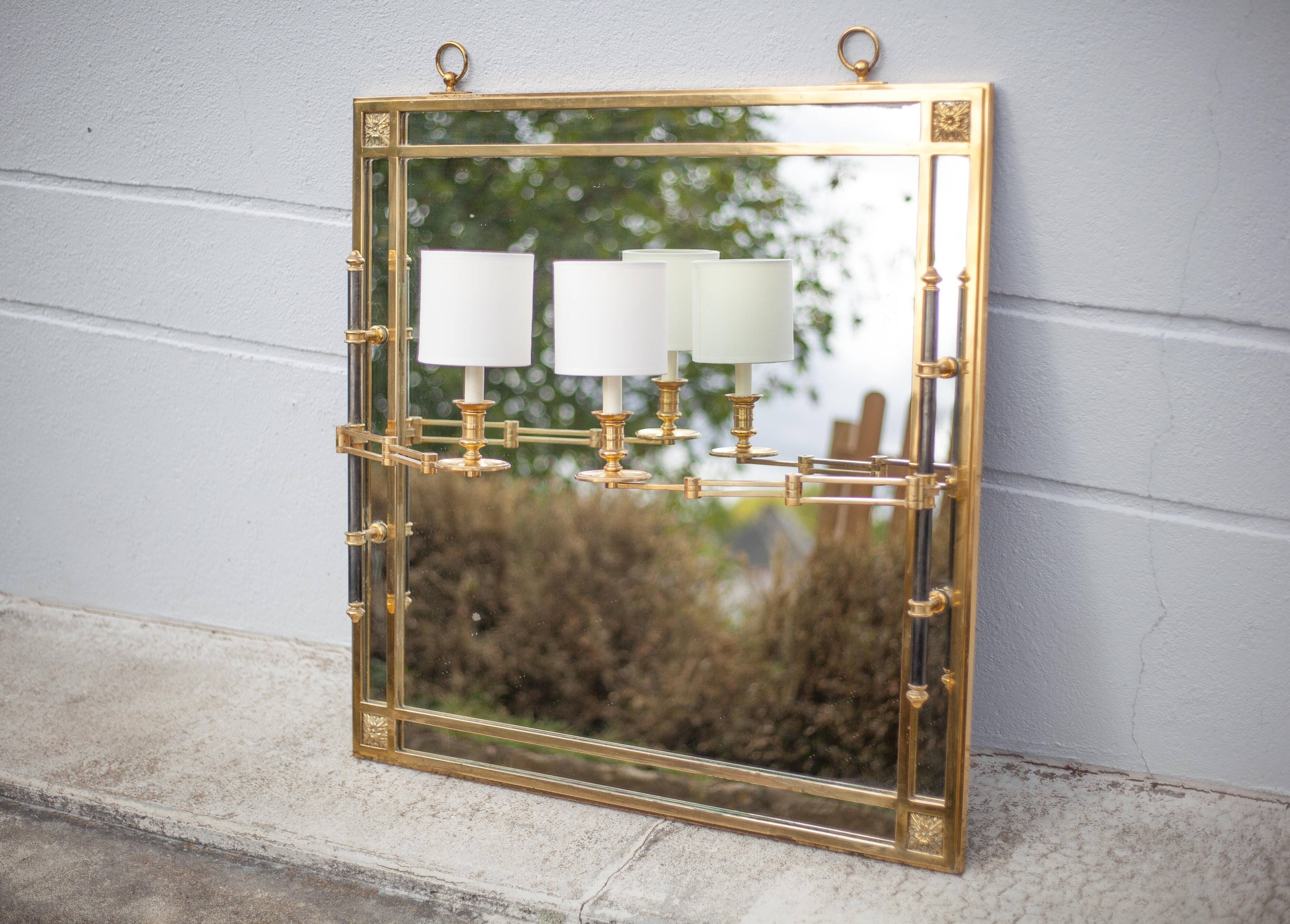 mirror with articulated wall light