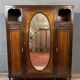 Louis Majorelle: Art Nouveau period mirrored wardrobe in Macassar and Walnut