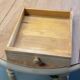 Round table with flaps or shutters renovated in raw solid wood
