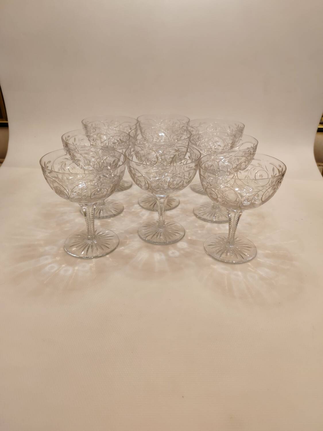 9 Clichy crystal champagne glasses, 19th century