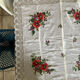 Linen tablecloth with embroidered flowers