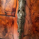 Louis XV style chest of drawers, richly inlaid, animated front and side. 19th century