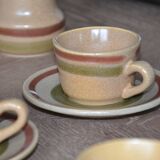 11 St Amand glazed stoneware cups and saucers/sugar bowl/milk jug