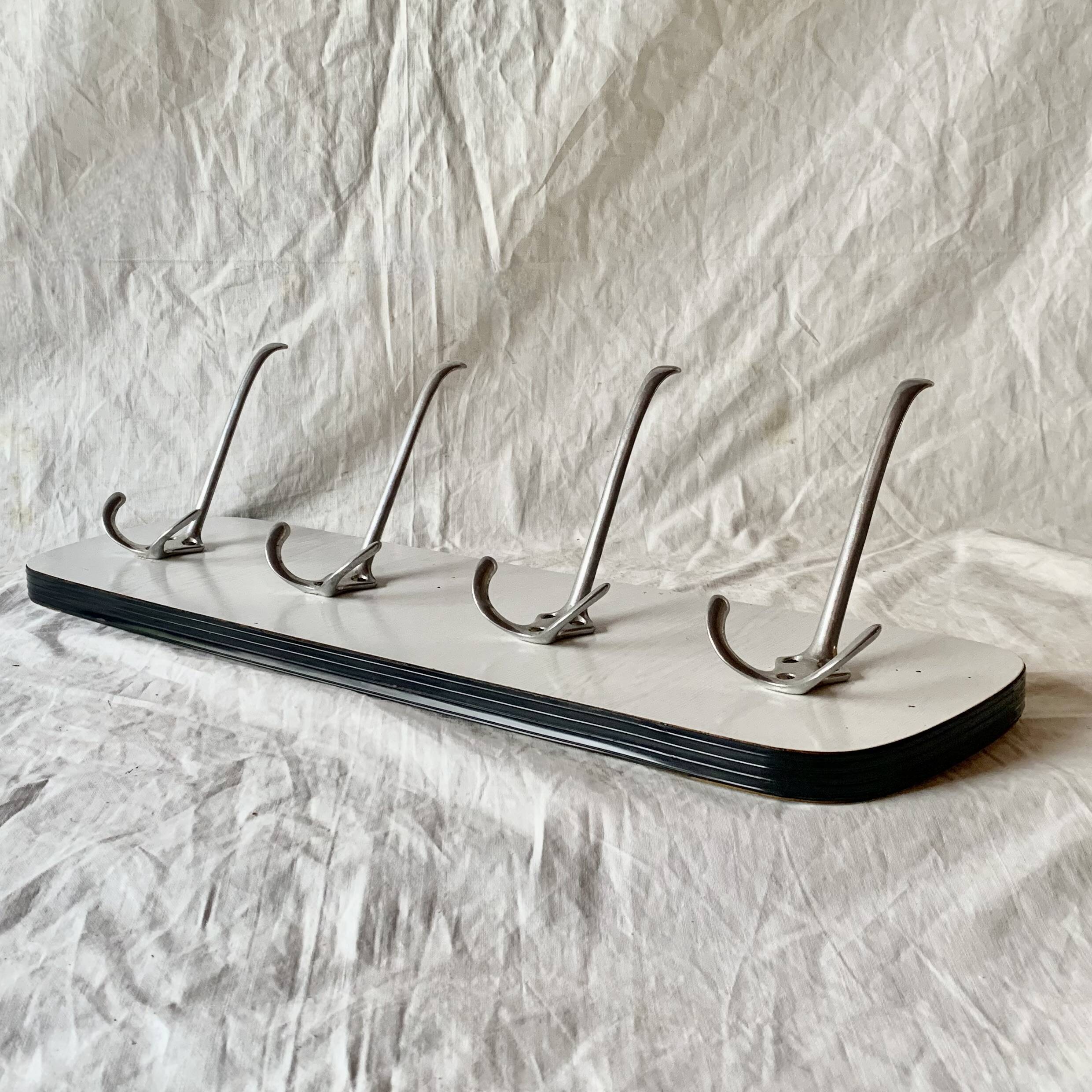 Vintage wall coat rack in white Formica - 4 cast aluminum coat hooks