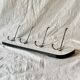 Vintage wall coat rack in white Formica - 4 cast aluminum coat hooks