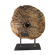 Old wooden pulley wheel on foot