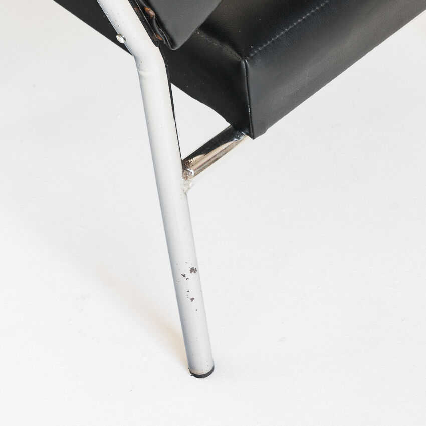 Pair of vintage low armchairs in chrome metal and skaï, Spain 1970