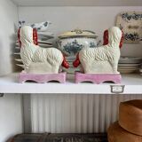 Pair of Staffordshire porcelain Cavalier King Charles dogs on terrace, 19th century.