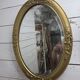 Miroir ovale style Louis XV doré miroir biseauté