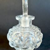 Old perfume bottle in molded