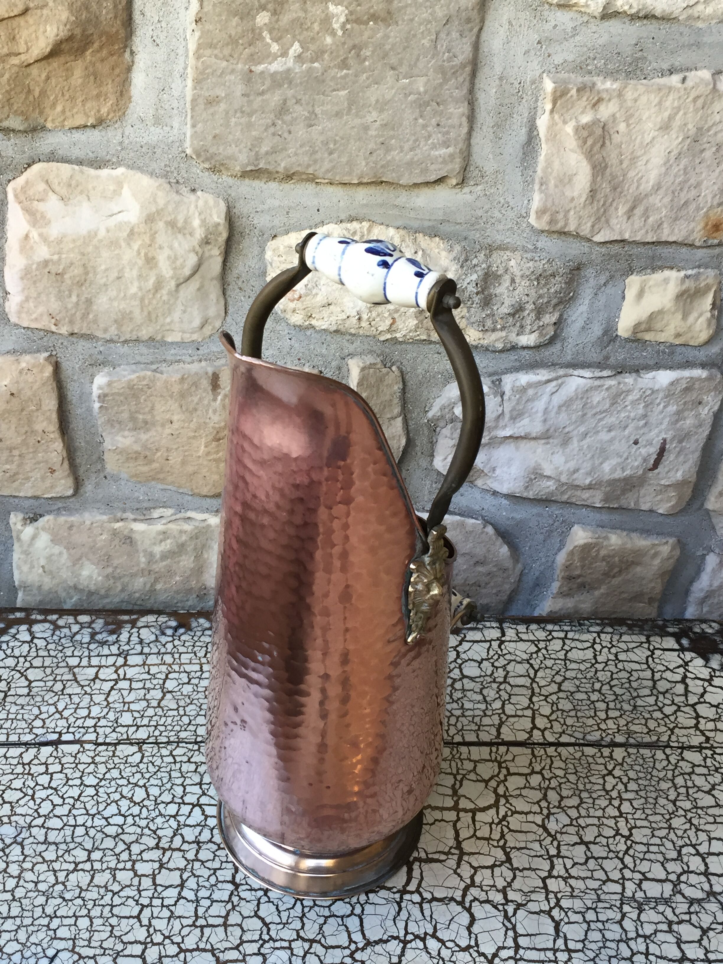 Pink hammered copper coal bucket and porcelain handles
